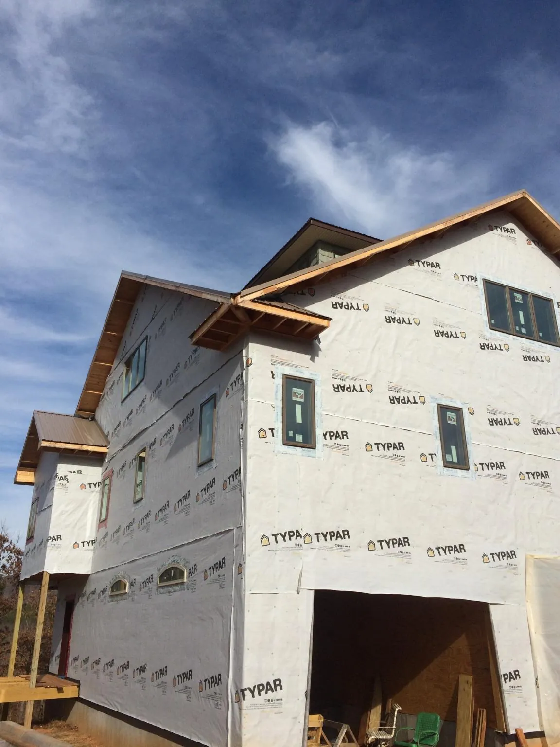 Stick built house wrapped in Typar with new roof framing and dormers in Yankton